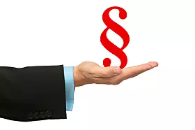 ausgestreckte Hand auf der Paragraphensymbol steht