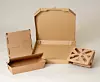Menübox, Pizzarkarton und Gemüseverpackung aus Wellpappe.