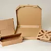 Menübox, Pizzarkarton und Gemüseverpackung aus Wellpappe.
