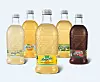 Die Ananas-Limonade Anjola wird dabei aufmerksamkeitsstark am Point of Sale präsentiert. Die moderne Verpackung erinnert an eine Ananas und hebt den fruchtigen Inhalt des Produktes hervor.