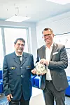 (v.l.n.r.): Bernard de Groot, Ortsbeauftragter des Ortsverbands Trossingen (Landesverband Baden-Württemberg, THW), Christian Traumann, Geschäftsführender Direktor und CFO, Multivac.